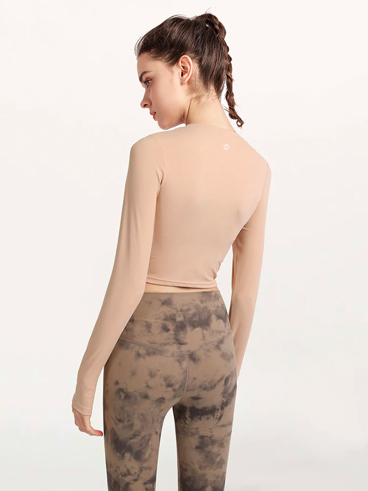 裾ねじり長袖シャツ