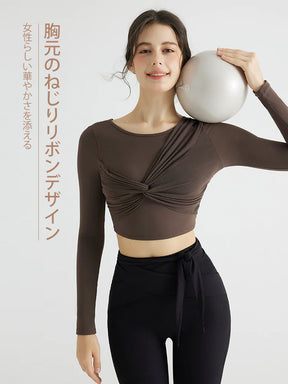 背中見せリボンデザインの長袖カップ付きヨガトップス