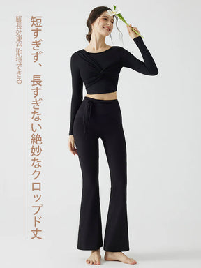 背中見せリボンデザインの長袖カップ付きヨガトップス