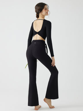 背中見せ蝶結び風デザインの長袖パッド付きトップス