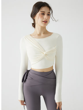 背中見せ蝶結び風デザインの長袖パッド付きトップス